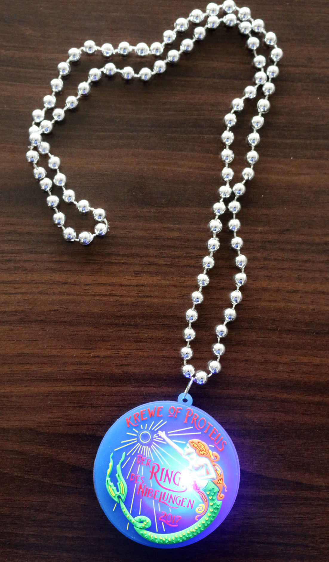 Krewe of Proteus throws: tridents, seahorses and mermaids